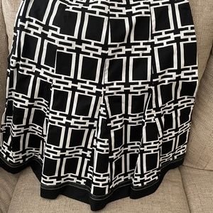 Cute & classy black and white SKIRT , size